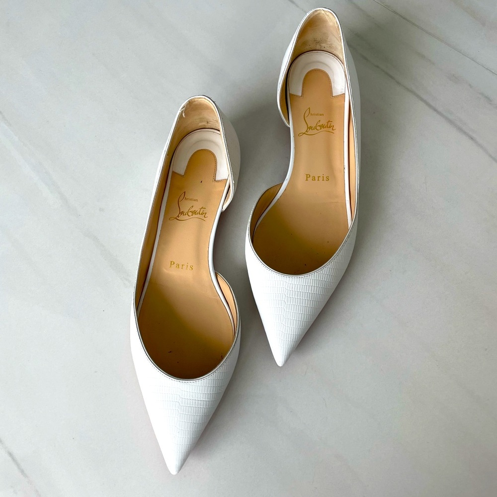 Like new Christian Louboutin embossed flats